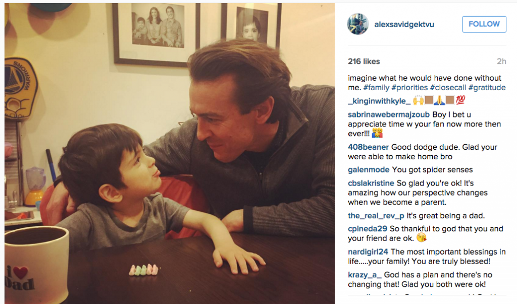 Alex Savidge posts a picture with his son after nearly being struck by a car while reporting.