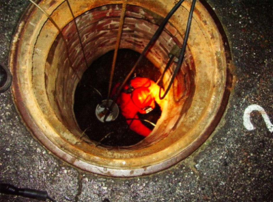 An engineer examines San Francisco's sewer system. The San Francisco News