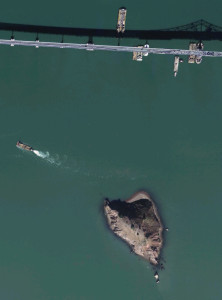 A shot of Red Rock Island from above in close proximity to Richmond-Rafael Bridge.