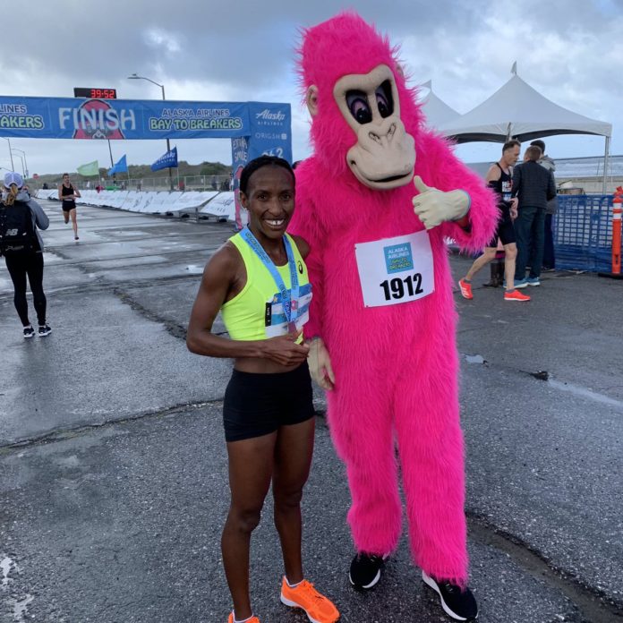 Bay To Breakers Runners Embrace The Rain