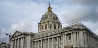 Demonstrators March To City Hall, Protest Immigration Reform