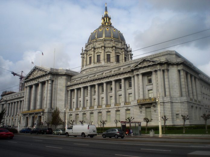 Demonstrators March To City Hall, Protest Immigration Reform