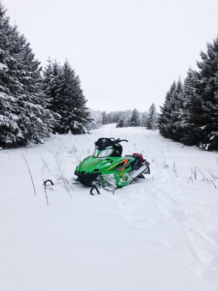 Man Dies After Snowmobile Accident