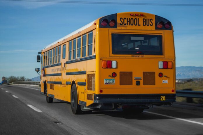 Driver Attempting To Pass A School Bus Causes Crash
