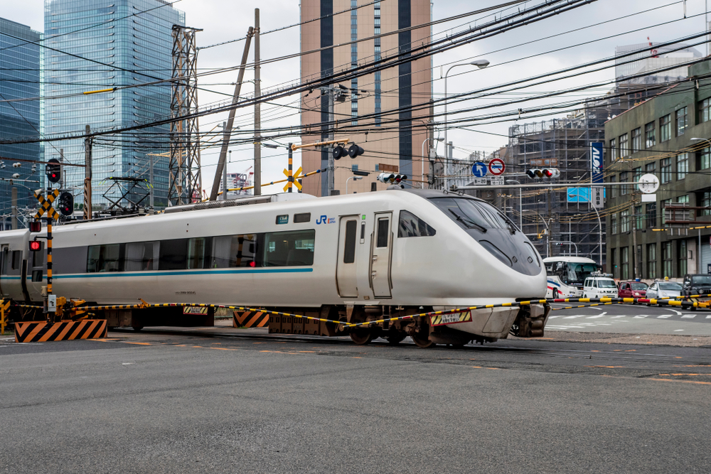 Osaka,,Japan-july28,2018;,Express,Train,Kuroshio,Passing,Train,Barrier,In,Umeda.